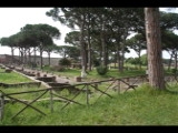 01884 ostia - regio ii - insula vii - piazzale delle corporazioni (ii,vii,4) - hintergrund theater.jpg